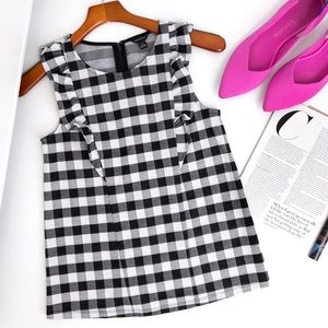 Ann Taylor .  Black and White Gingham Ruffle Front Top